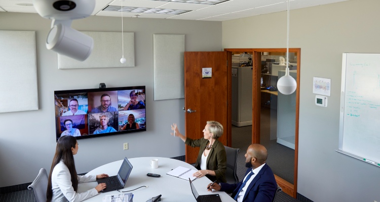 av installation near syracuse ny team sitting in conference room with virtual meeting